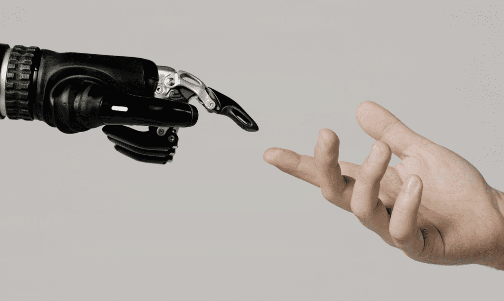 one robotic hand and one human hand reaching for eachother, ai dating apps vs the matchmaker uk